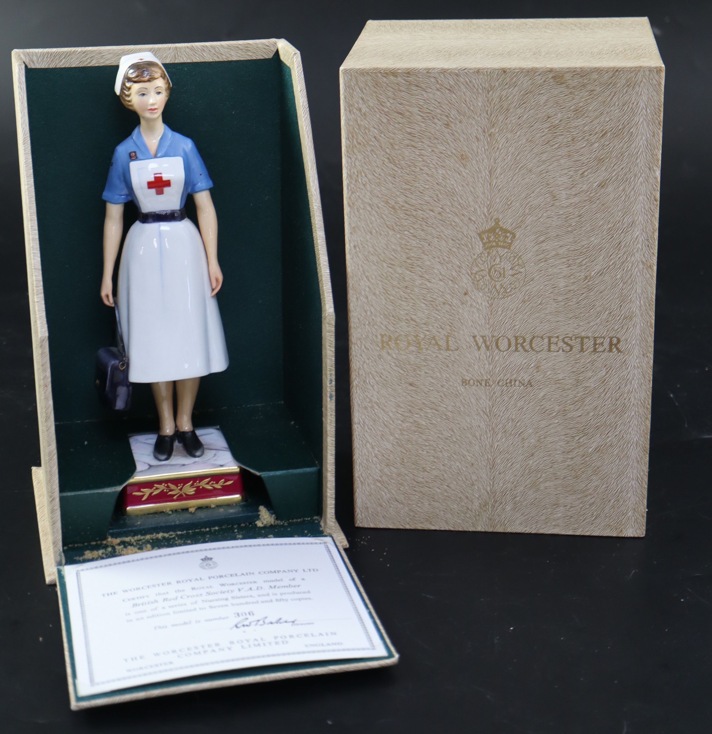 A Royal Worcester model of a British Red Cross Society V.A.D. Member, height 22cm